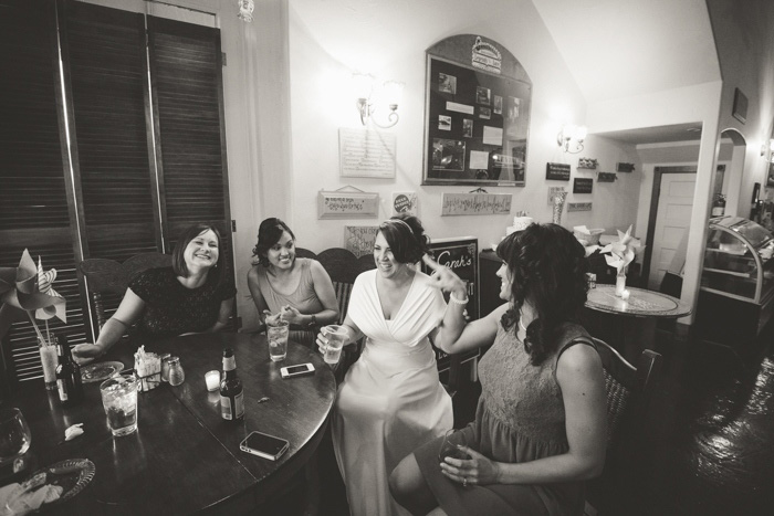 bride chatting with guests at wedding reception