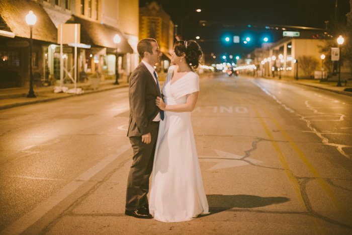 bride and groom portrait in the street