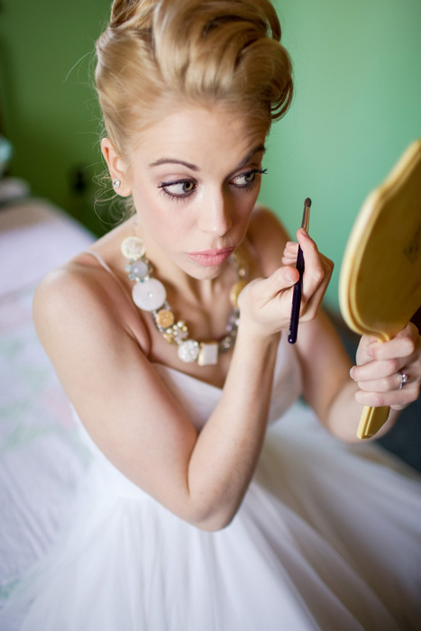 bride doing her make-up