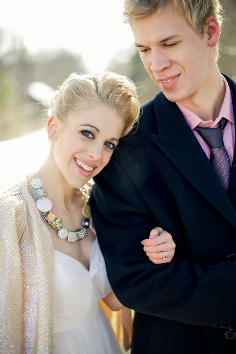 bride leaning her head on groom's shoulder