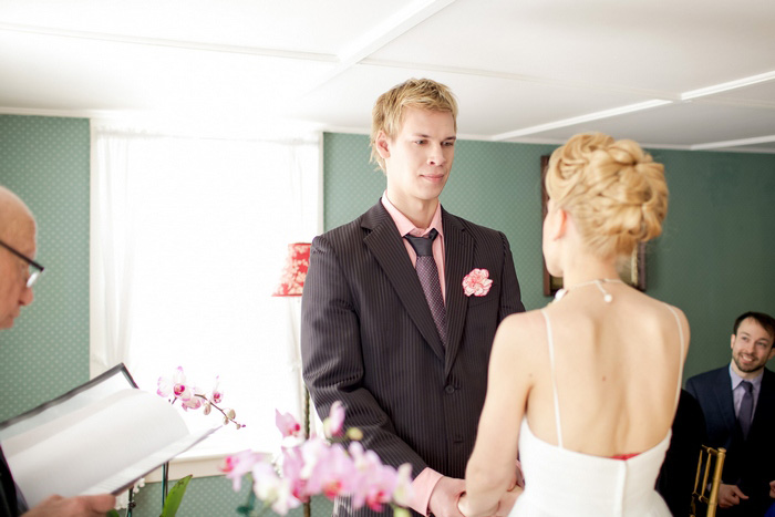 bride and groom exchanging vows