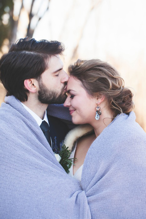 cozy bride and groom winter portrait