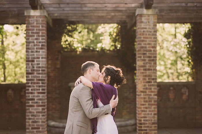 bride and groom first kiss