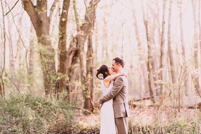 bride and groom kissing portrait