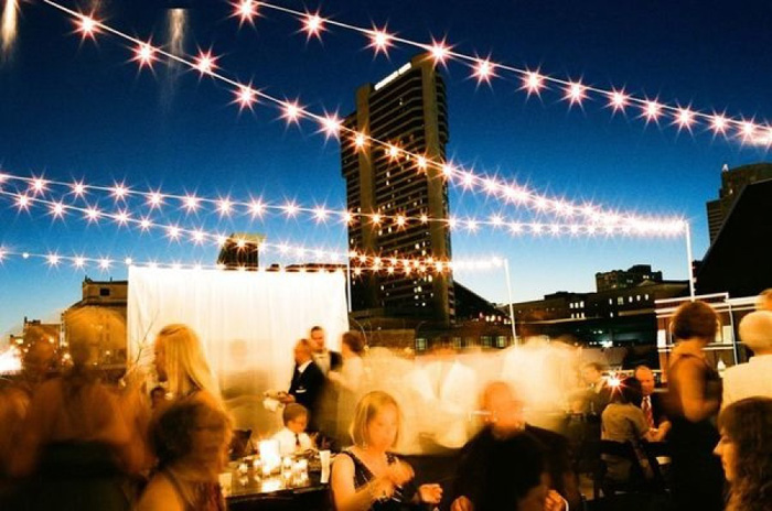 nighttime rooftop reception