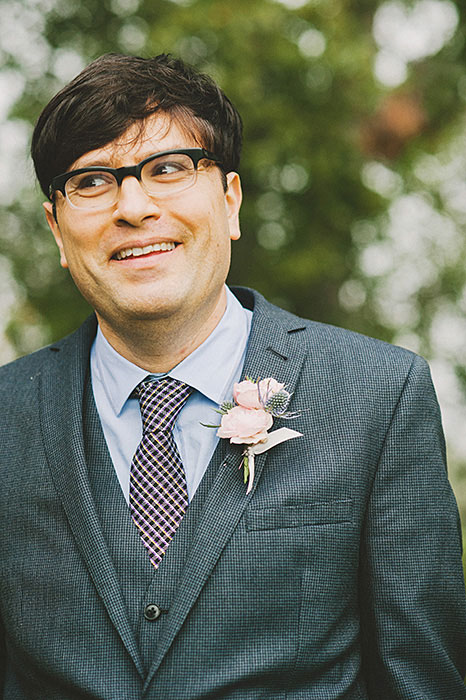 groom with rose boutonniere