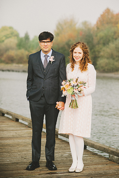 bride and groom on dock