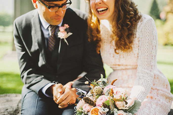 bride and groom laughing