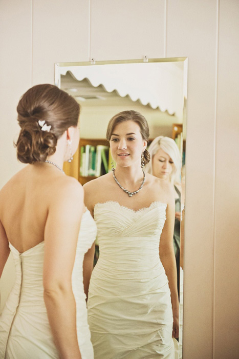 bride looking in the mirror