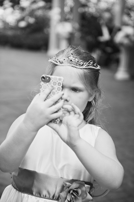 flower girl with iphone