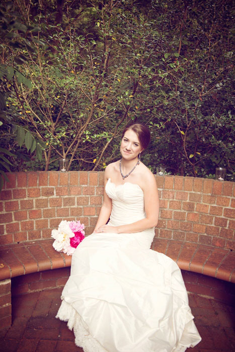 bride portrait sitting on bench