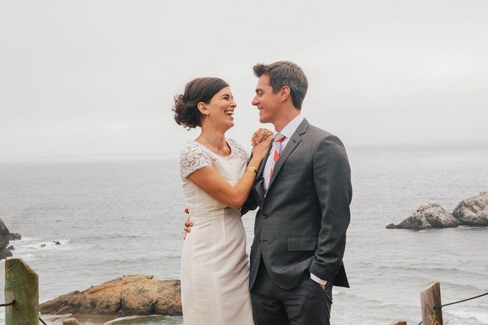 bride and groom oceanside portrait