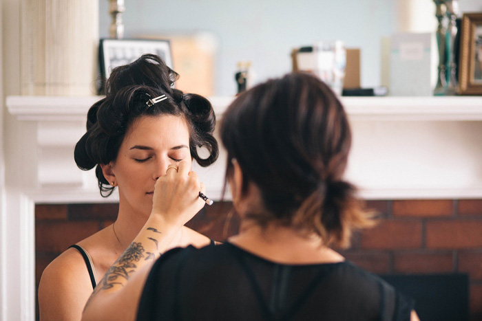 bride getting her make-up done