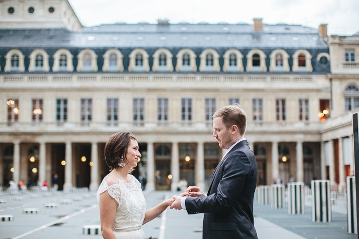 bride and groom exchanging rings