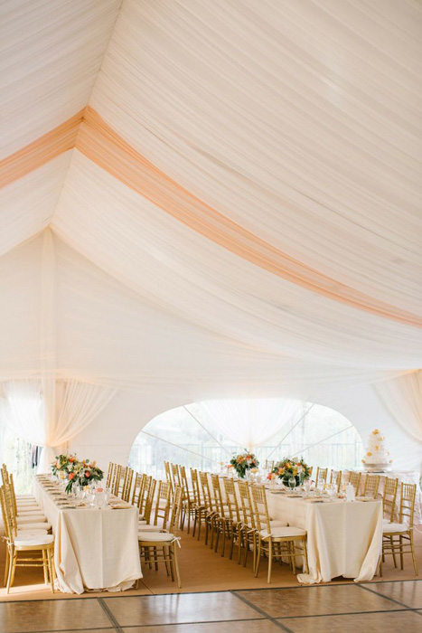 frame tent with draped ceiling