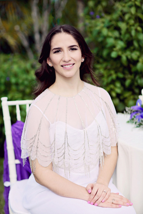 bride in beaded capelet