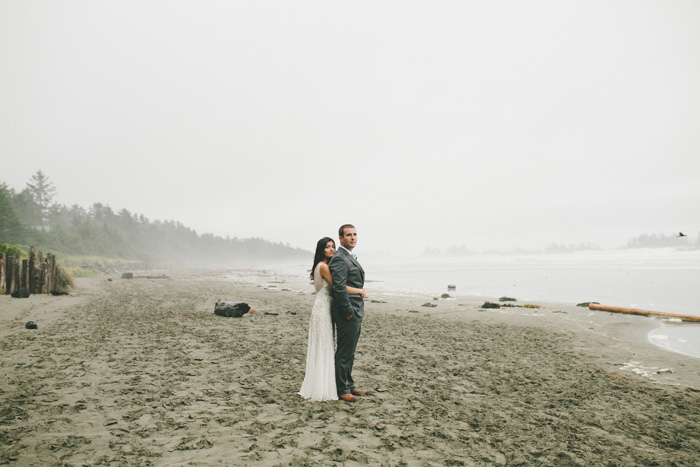 bride and groom on foggy beach