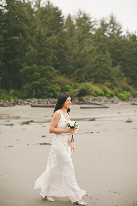 bride walking on the beach