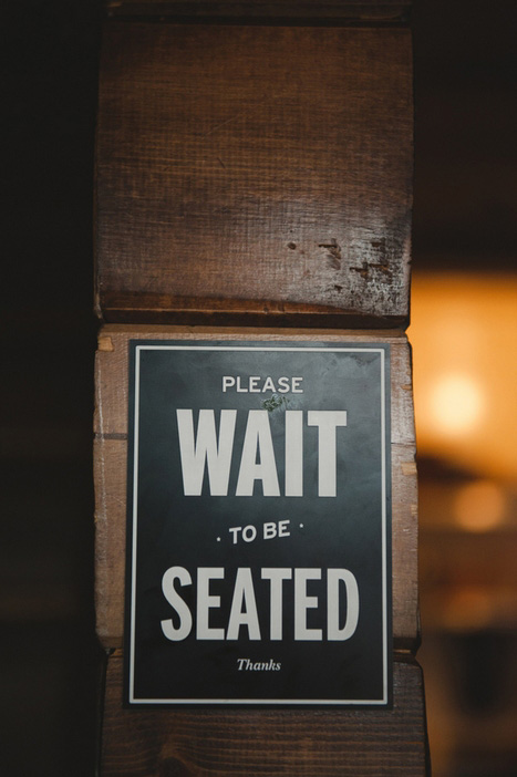 wait to be seated sign