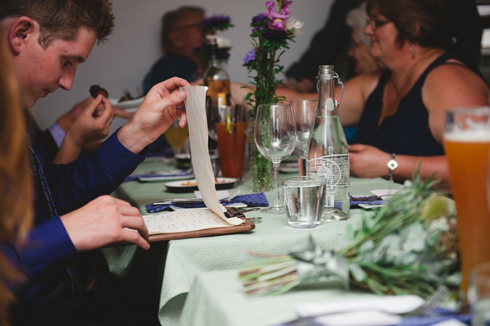 guests reading wedding menu