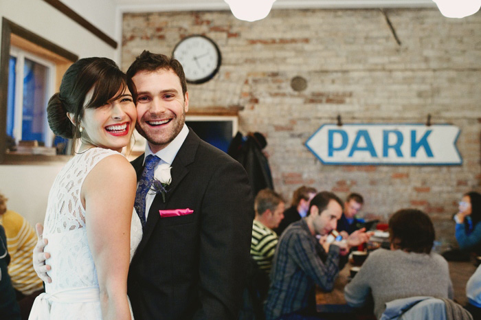 bride and groom portrait in a coffee shop