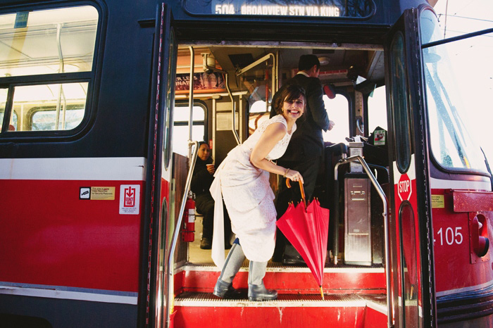 bride getting on the streetcar