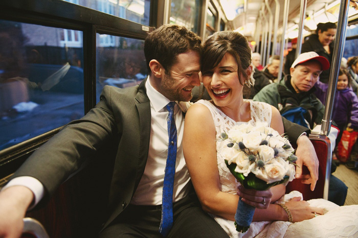 bride and groom riding the streetcar