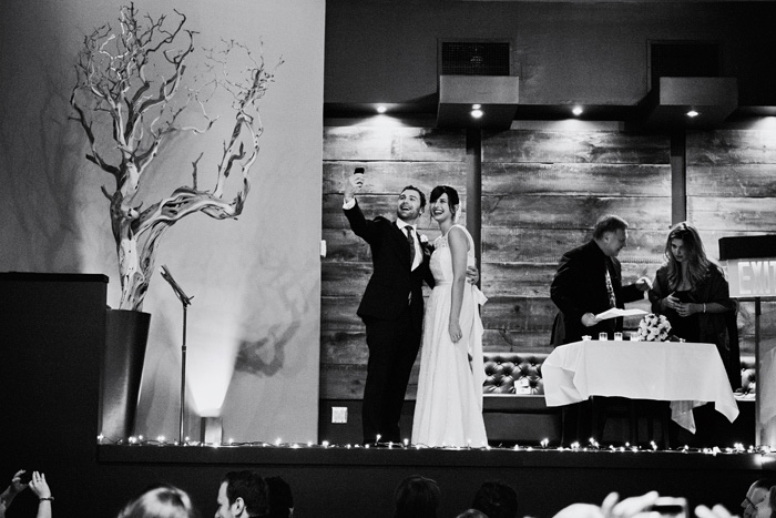 bride and groom taking selfie after ceremony