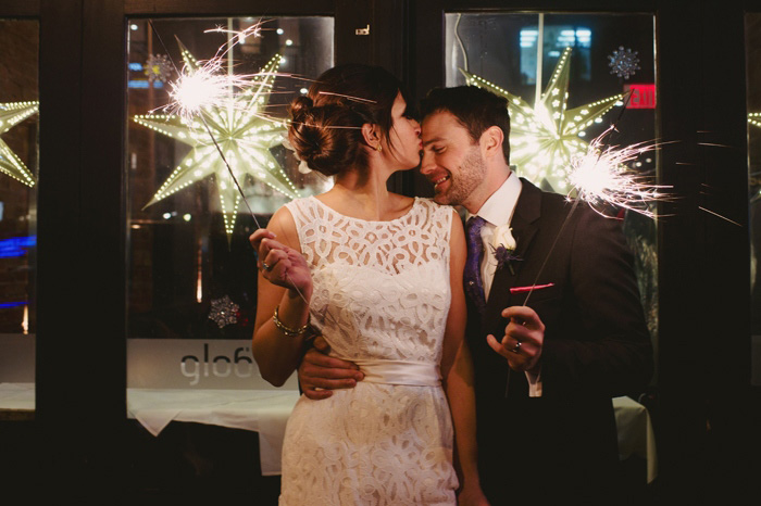 bride and groom with sparklers