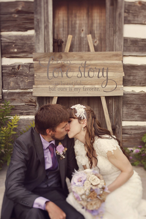 bride and groom kissing portrait