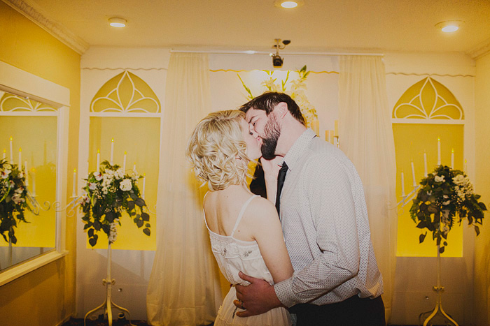 bride and groom first kiss