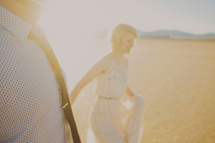 bride walking through the desert