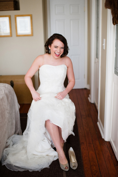 bride putting on shoes