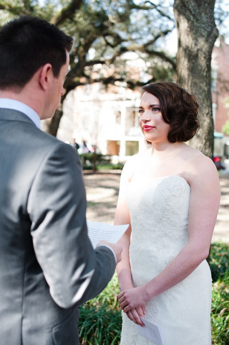 bride listening to groom's vows