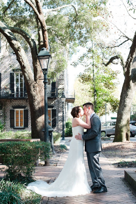 bride and groom first kiss