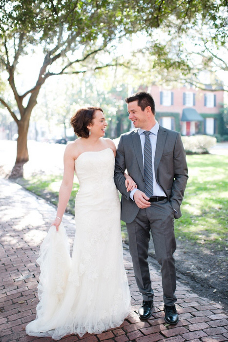 bride and groom walking down the street