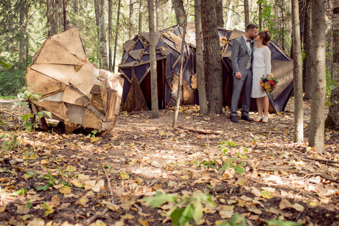 bride and groom in the woods