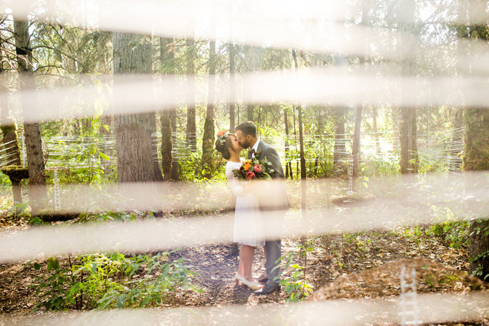 bride and groom kissing portrait