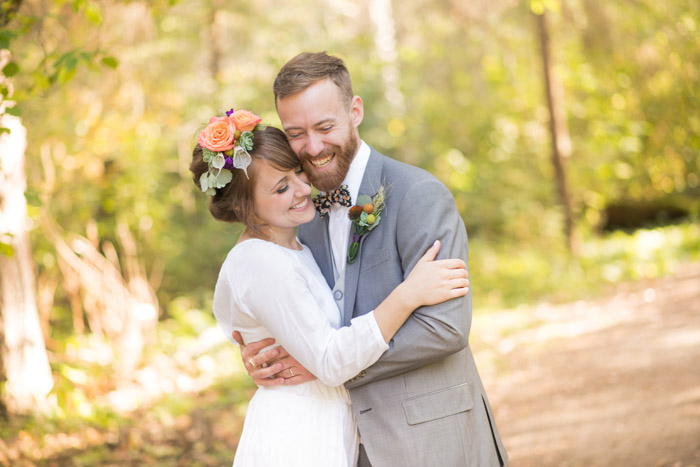 bride and groom hugging