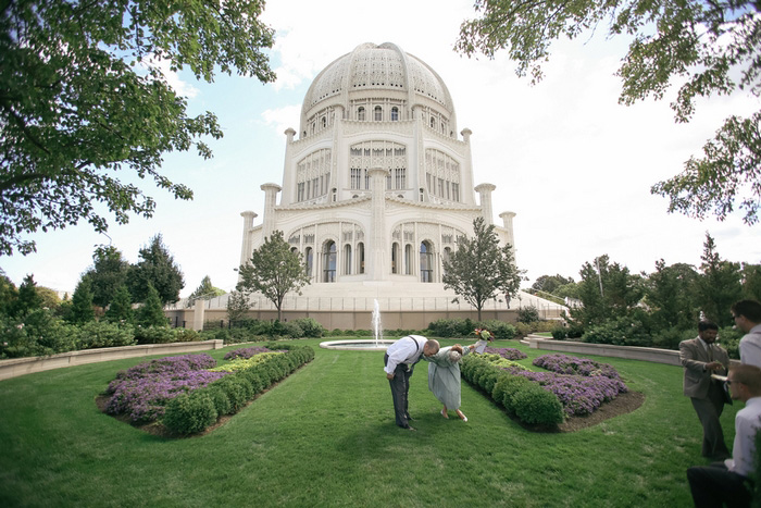 bride and groom bowing