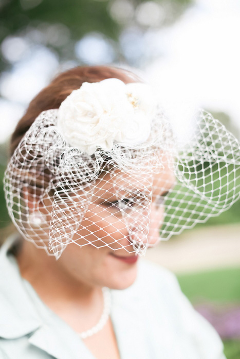 bride in birdcage veil