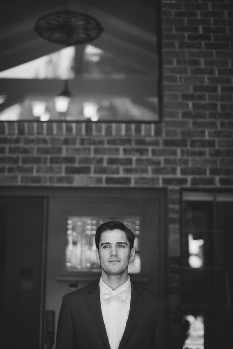 black and white groom portrait