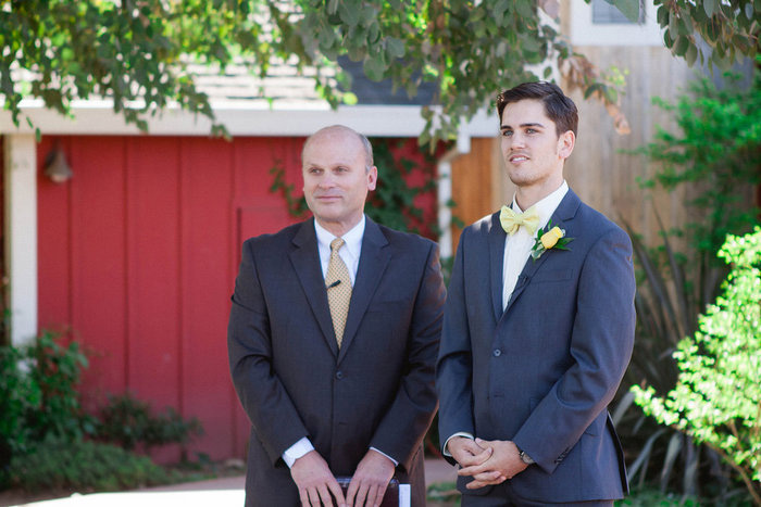 groom waiting at the altar