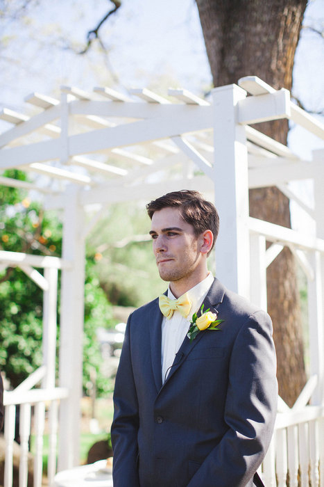 groom waiting at the altar