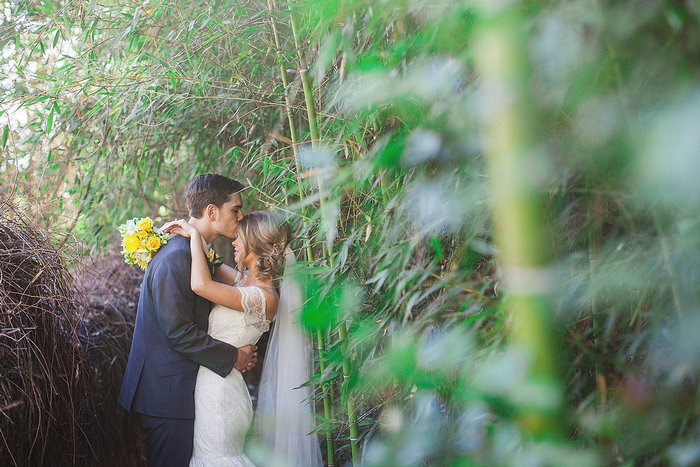 bride and groom kissing