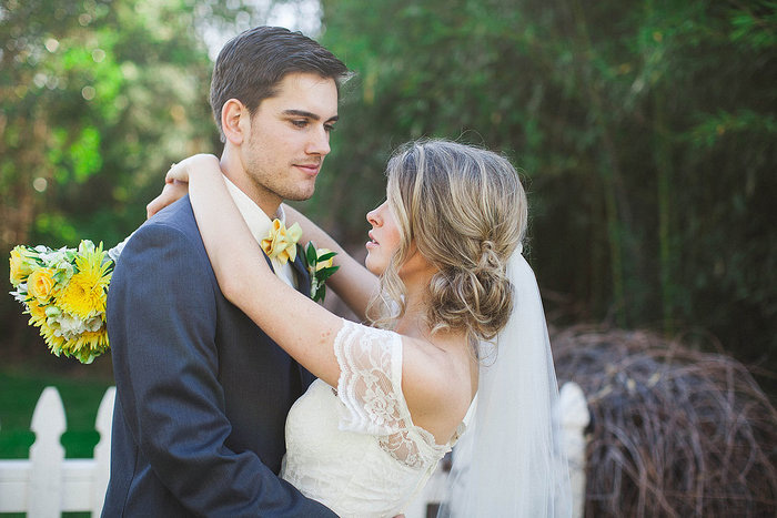 bride and groom embracing