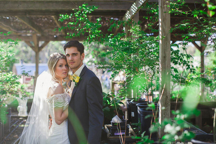 bride and groom on flower farm