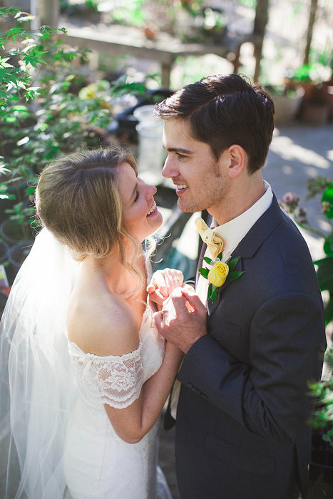 bride and groom laughing