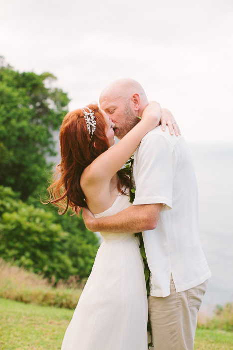 bride and groom first kiss