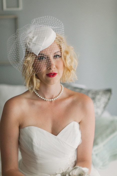 bride sitting on bed